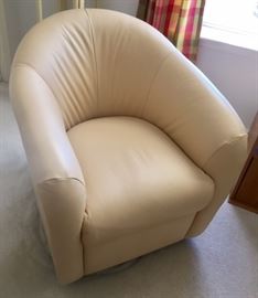 "Sand" colored Vinyl swivel Club Chair        $95.00