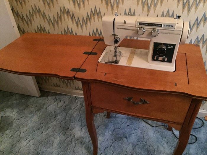 Vintage Capitol Sewing Machine in cabinet