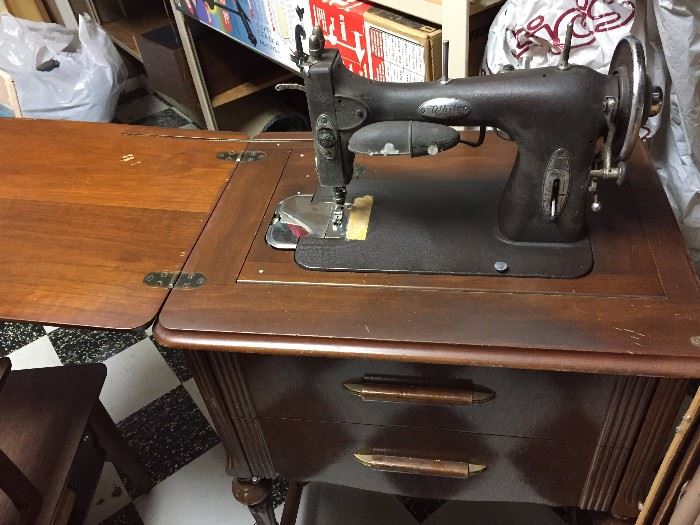 Antique White Sewing Machine in cabinet