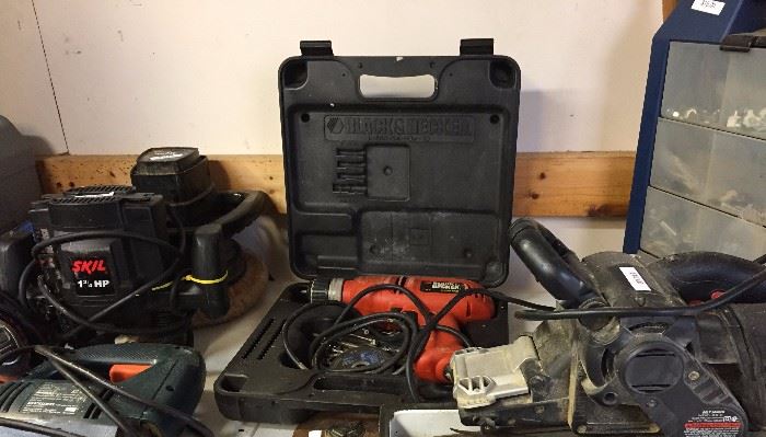 Drill, jigsaw, sander, and other assorted tools