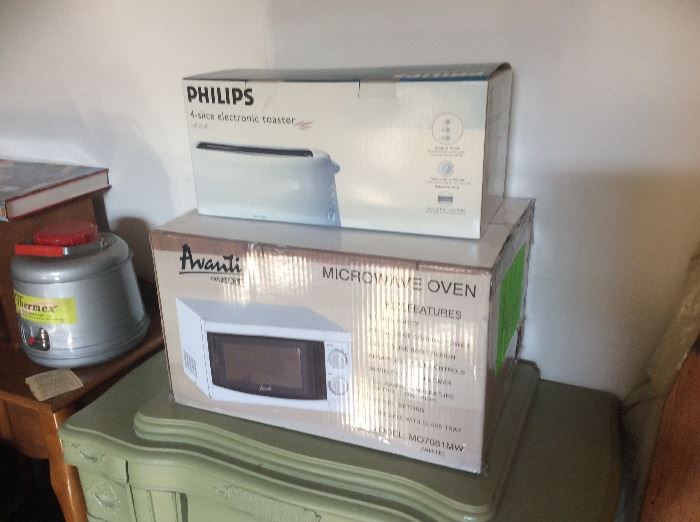 NEW IN THE BOX MICROWAVE AND TOASTER