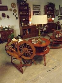Spinning wheel, Sprague & Carleton book shelf table, brass table lamp