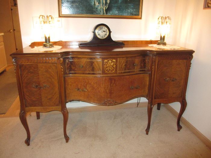 French country buffet with highly figurative maple and mahogany inlays