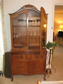 French country china cabinet with highly figurative maple and mahogany inlays