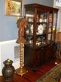 clay Oriental covered pot, plant stand, resin statue, Empire china cabinet, etc.