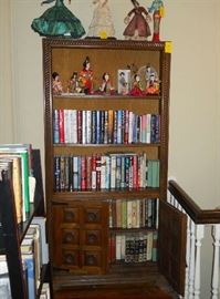 bookcase, books, dolls, etc.