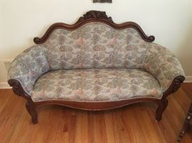 Antique settee in wonderful condition with carved details