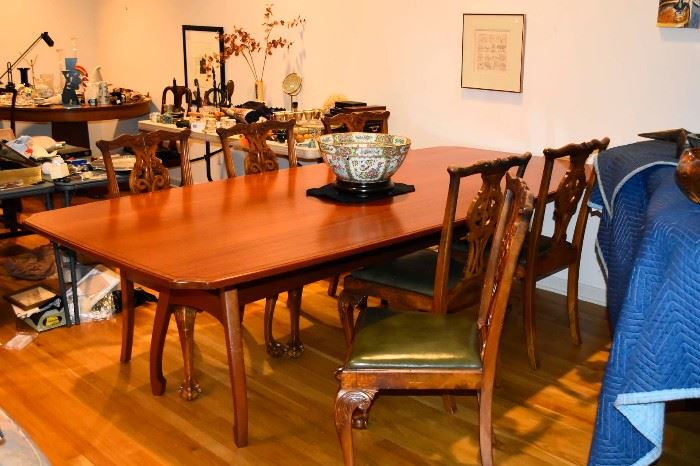  Custom made dining table with 6 centennial Chippendale style English chairs circa 1880.