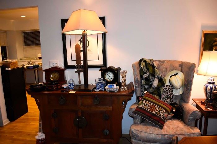  Antique clocks, lamps, wing back upholstered chair, Asian cabinet, pillows, etc.
