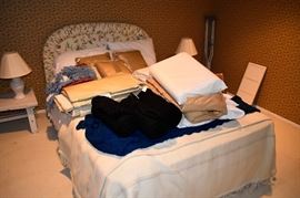  Upholstered headboard, linens.