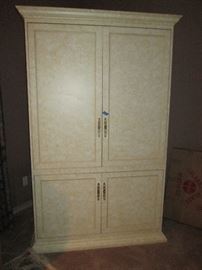 Large entertainment cabinet, could also be easily transformed into useful storage or a wardrobe.