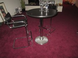 Tables have chrome and metal base. There are 2 in this sale.
