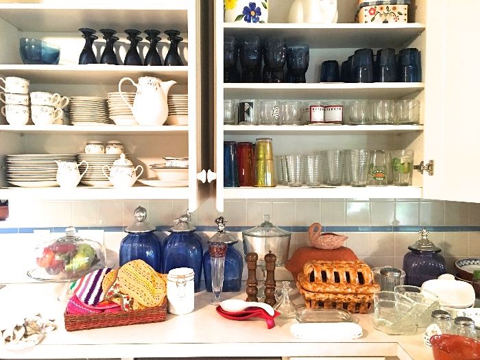 Vintage blue glassware, dishes, baking pans, cake stands.