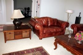 Leather Loveseat, Center Table with Wicker Storage Area