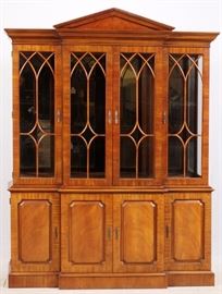 Lot#26, 90" HENREDON, MAHOGANY BREAKFRONT H 90" W 70"Classical upper crest with crown moldings above four upper wood lattice and glass paneled doors, opening to two shelves. Bottom section has four doors with paneled facades with brass pulls opening to single shelves. Moldings about the base.