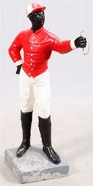 Lot#37, JOCKEY CEMENT, HITCHING POST, 19TH C, H 44", W 27"Hitching post in the form of a jockey. Painted red and white. Square base 14" x 14".