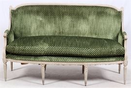 Lot#81, LOUIS XVI STYLE SETTEE, H 40", W 64", D 21"Painted frame with green diamond velvet upholstery, one large loose cushion, and four front and back stop-fluted tapered legs. From the Estate of Daniel Clancy, Voltaire Place, Grosse Pointe Farms.