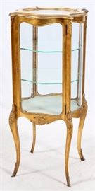 Lot#2224, LOUIS XV STYLE, GLASS & GILT WOOD CURIO CABINET, H 48", W 21", D 21"Glass curio cabinet painted gold frame. Late 19th or early 20th century. Curved legs with glass shelves. Acanthus design with beading. Number 974 on the bottom of cabinet. With key.