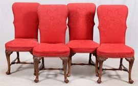Lot#2417, QUEEN ANNE STYLE RED FLORAL UPHOLSTERED SIDECHAIRS, SET OF 4.Having oak carved legs, shell carved knees, club feet, an "H" form stretcher, and red floral upholstery with brass nail head trim.  From the Estate of Daniel Clancy, Voltaire Place, Grosse Pointe Farms.