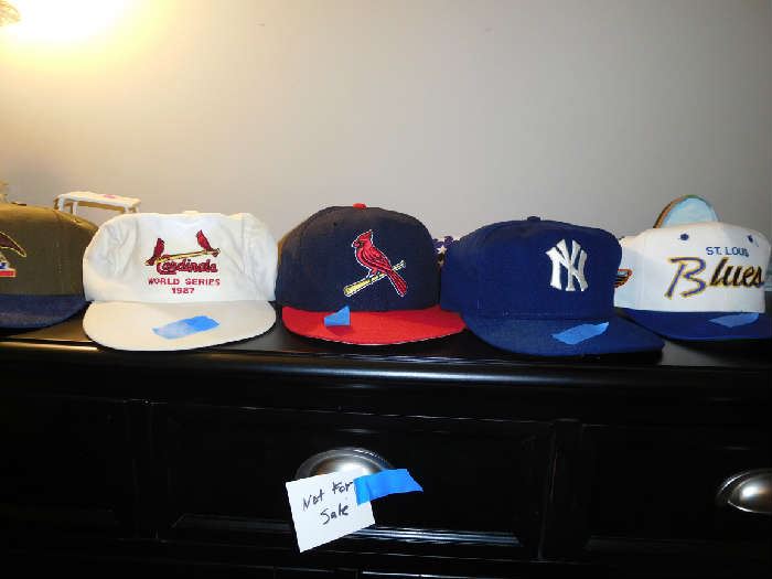 many  sports  caps  and  some  brewery  caps-probably  never  worn