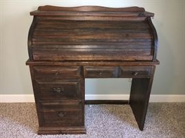 2 petite pine roll top desks.