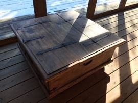 Solid wood coffee table with storage. Rustic style with de Iraqi emperor metal.