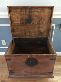 Solid wood square table with storage--rustic style and with decorative metal.