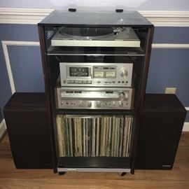Pioneer sound system--turntable, receiver, stereo cassette tape deck, speakers, racks--all working and in good condition.