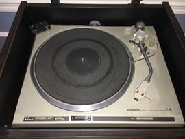 Pioneer sound system--turntable, receiver, dual cassette deck, speakers, rack--all working and in good condition.