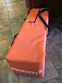 Room 2 travel crib--like new in bag.