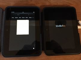 Two Amazon Kindle Fire tablets with chargers, 2nd generation.
