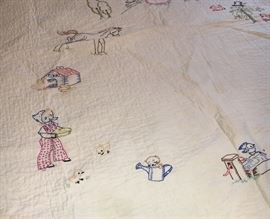 Adorable vintage baby/child quilt with charming hand-embroidery.