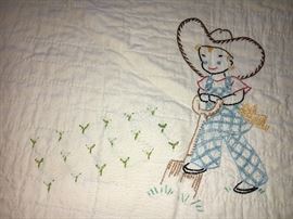 Adorable vintage baby/child quilt with charming hand-embroidery.