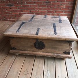 Solid pine table with storage. Rustic style with decorative metal.