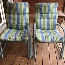 Pair adjustable patio chairs with nice canvas cushions.