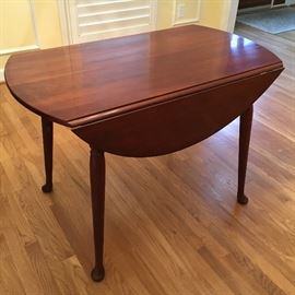 Vintage solid cherry drop-leaf table, Queen Anne legs.