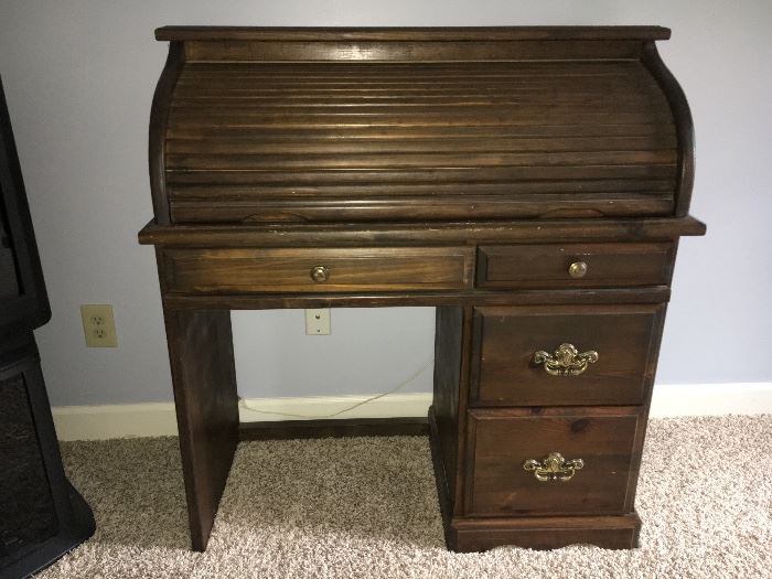 2 petite pine roll top desks.