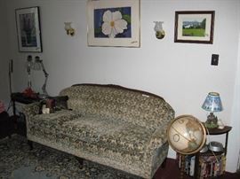 Paintings and framed photos by homeowner.