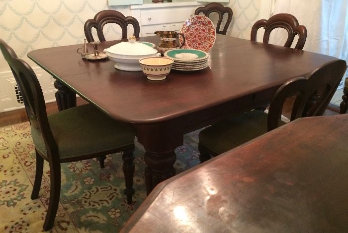 Dining Table with 4 leaves, crank mechanism ; Circa 1900 & 6 Side Chairs; Carved, Early 20th Century