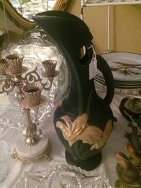 Tall, slender Roseville pitcher