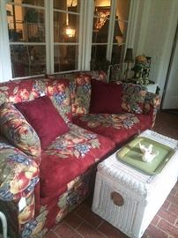 Red/fruit love seat; small white wicker chest