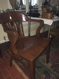 One of two antique library chairs