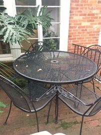 Patio table & 4 chairs; large philodendron plant