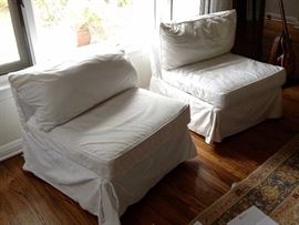 2 White Large Chairs. (Fabric needs cleaning)