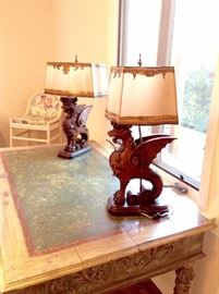Pair of Antique Italian Renaissance Heavily Carved Gargoyle Table Lamps with Hand-Painted Parchment Shades Detailed w/Gold Leaf Design and Embellished w/Silk Trimmings by Dagmar 
16" x 27" x 11"
