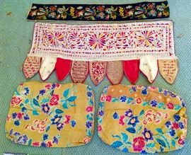 Vintage Textiles
Colorful&nbsp;Mexican woven wall hanging.
Ethnic floral pillowcases.
Moroccan mirrored wall/door hanging.
Vintage floral scroll tapestry band.