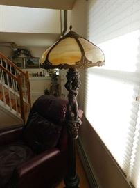 Carved standing lamp