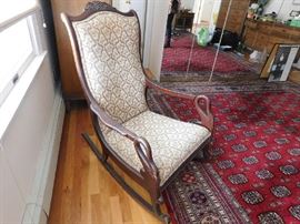 rocking chair with goose/swan head 