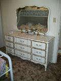 French provincial dresser with mirror,lots of storage and we have another bedroom set with king bed,dresser,nightstands and armiore in a pleasant olive green it's a must see!