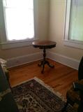 Round carved occasional table